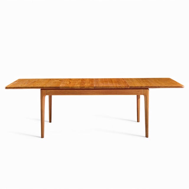 Glostrup Møbelfabrik Mid Century Danish Teak Hidden Leaf Dining Table with 2 Leaves This table measures: 60.25 wide x...