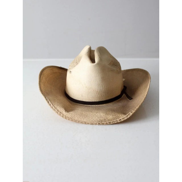 This vintage Rockmount Ranch Wear hat is as classic as they come. With a black hat band and crease, you can make a...