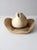 This vintage Rockmount Ranch Wear hat is as classic as they come. With a black hat band and crease, you can make a...