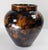 We are selling this interesting piece of redware pottery. The pottery base appears to be a glazed redware that has been...
