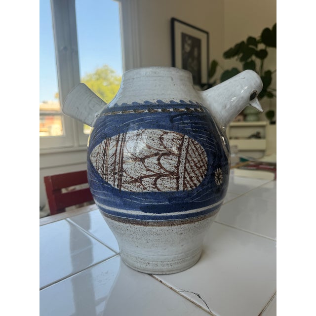 Vase of the 50's of the French ceramist Michel Barbier. Rare rooster shaped vase glazed with blue, beige and brown colors....