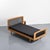 Single bed designed by Roger Landault for Ligne Roset in France around 1965. Made of oak veneer, it rests on four tapered...