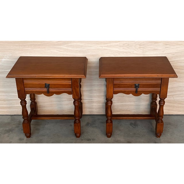 20th century Pair of Spanish nightstands with one drawer . The table has beautiful carved drawers with original color...