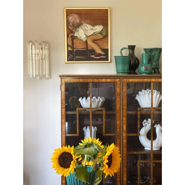 Murano glass wall sconce consisting of nine crystal prisms with finishes and fittings in chrome. Glass from the italian...