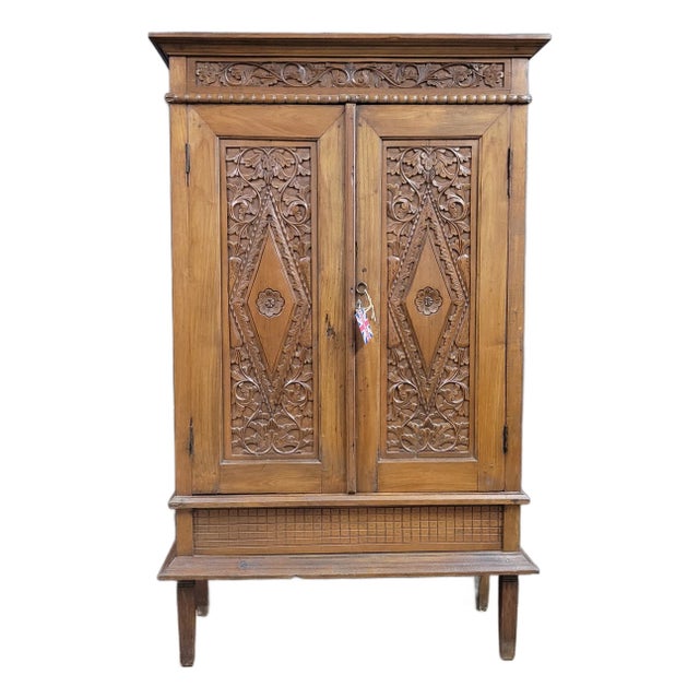 Early 20th Century Carved Walnut French Cupboard For Sale