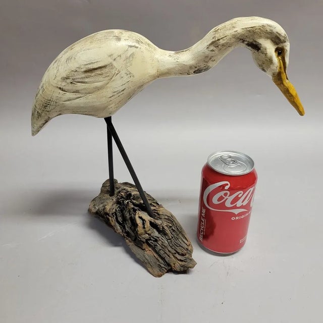 An unusual shorebird angled on driftwood by North Carolina carver, Harriet Corwin, NC (1921-2018). Hand carved and painted...