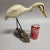An unusual shorebird angled on driftwood by North Carolina carver, Harriet Corwin, NC (1921-2018). Hand carved and painted...