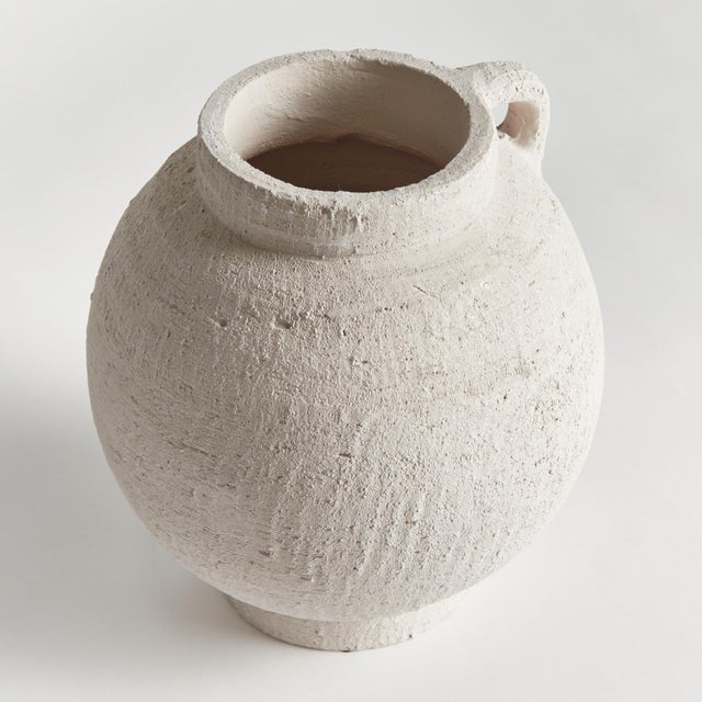 Amphorainspired vessel with a modern sensibility, this vase is made to inhabit the contemporary space. Handthrown with a...