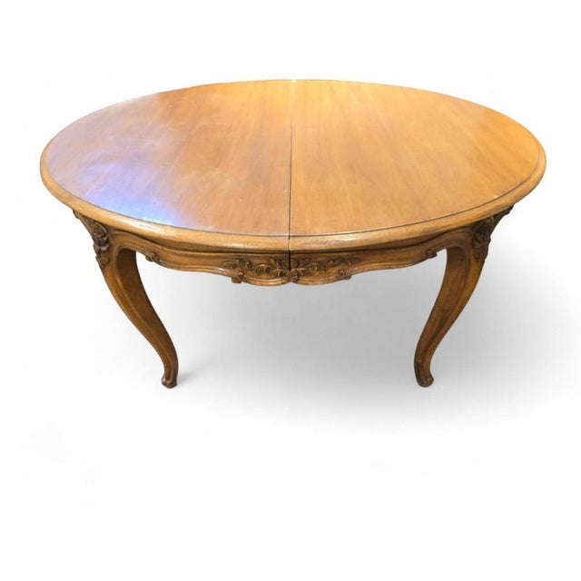 Impressive and substantial French dining table crafted in solid oak during the 18th century. The table features a...