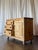 Description: This Early 20th Century pine dresser combines simple, timeless design with beautiful carved detailing. The...