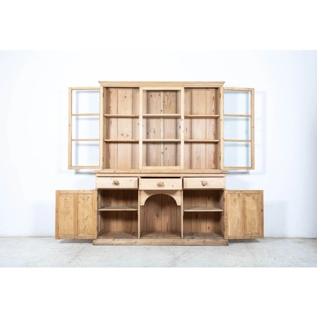 19th century large english pine glazed panelled dresser. 2 sections. measures: w 170 x d 45 x h 213 cm base w 170 x d 45 x...