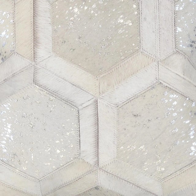 This luxurious Cowhide Throw Pillow is hand-cut and hand-stitched. Each panel is carefully selected for rich color and...