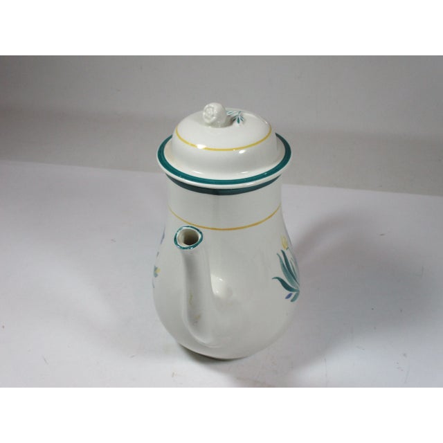 Vintage Adams English cream-colored ironstone coffee pot. It is hand painted with primitive floral designs in shades of...