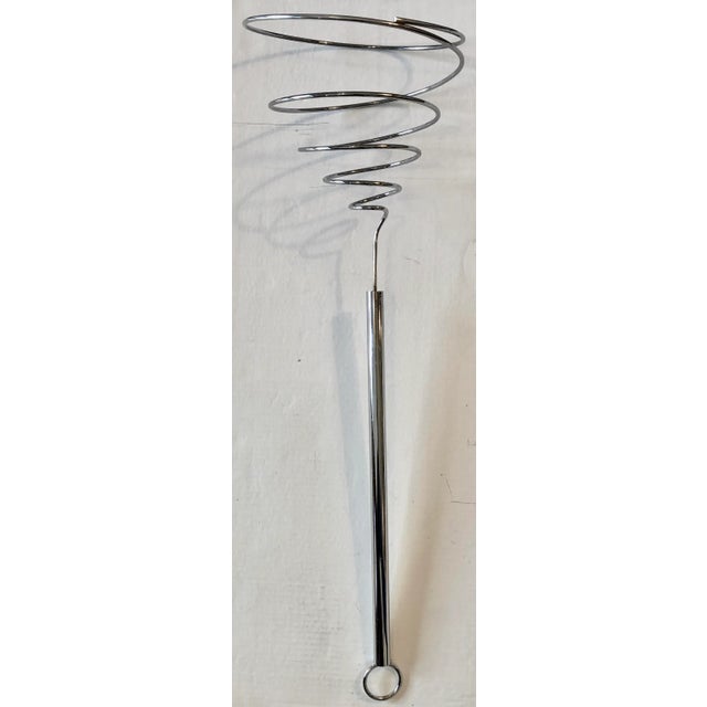 Giant drinks whisk sculpture dated 1974 and signed C. Jere. There is very light pitting.