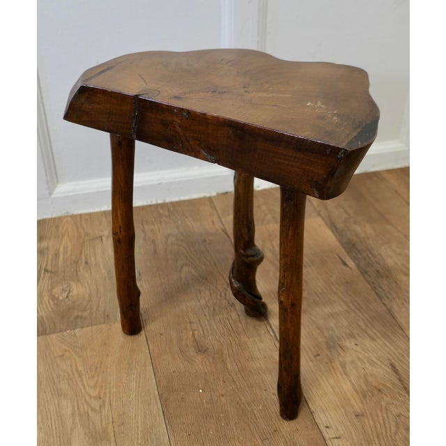 Solid Slice of Live Edge Elm Rustic Stool A slice of elm cut from one piece of the Tree, flat with a live edge and uneven...