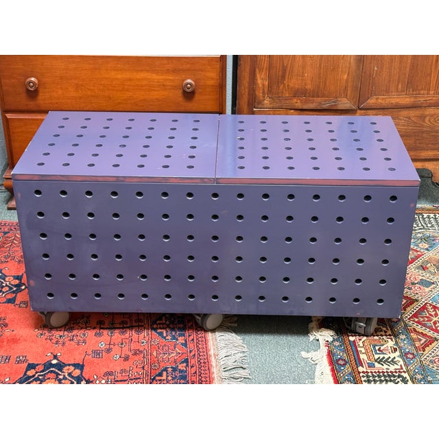 Design Plus Gallery presents a Storage Table on Casters. The rolling console cabinet can work as a coffee table or...