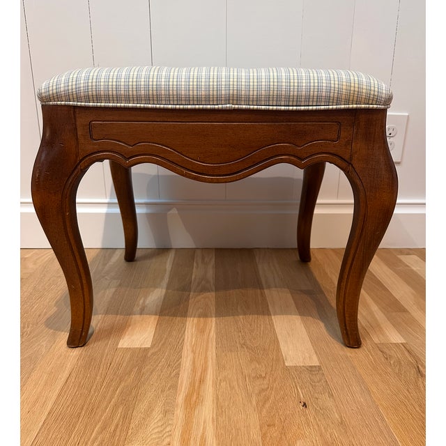 Add a touch of classic charm to your home with this beautiful pair of Ethan Allen French Country ottomans. Crafted with a...