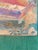 Colorful vintage abstract artwork signed Tom Roll ’89 in the lower right corner. This piece features layered geometric...