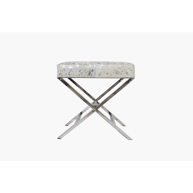 Make your room feel like a modern retreat. This Foil-printed steel and cowhide bench boasts sleek lines and chic design,...