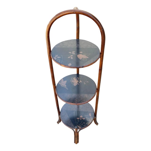 1970s Costal Three Tiered Dark Stained Rattan Shelf w East Asian Motif Tops For Sale