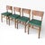 This set of vintage oak dining chairs combines solid oak craftsmanship with timeless style to enhance your dining space....