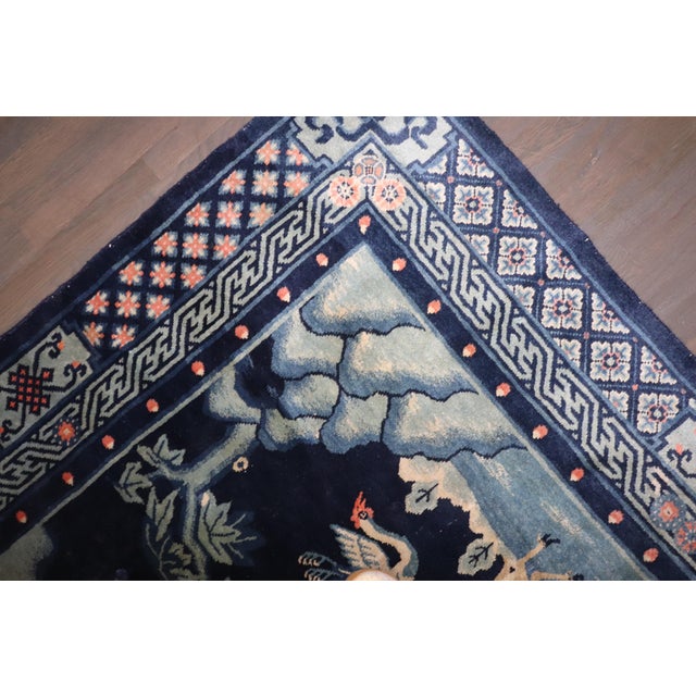 An early 20th-century Mongolian Pictorial Animal Rug Details rug no. j4554 size 5' 5" x 6' 2" (165 x 188 cm)