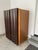 Contemporary Italian design wood cabinet with waved facade doors and hidden grips. Quality craftsmanship and robust...