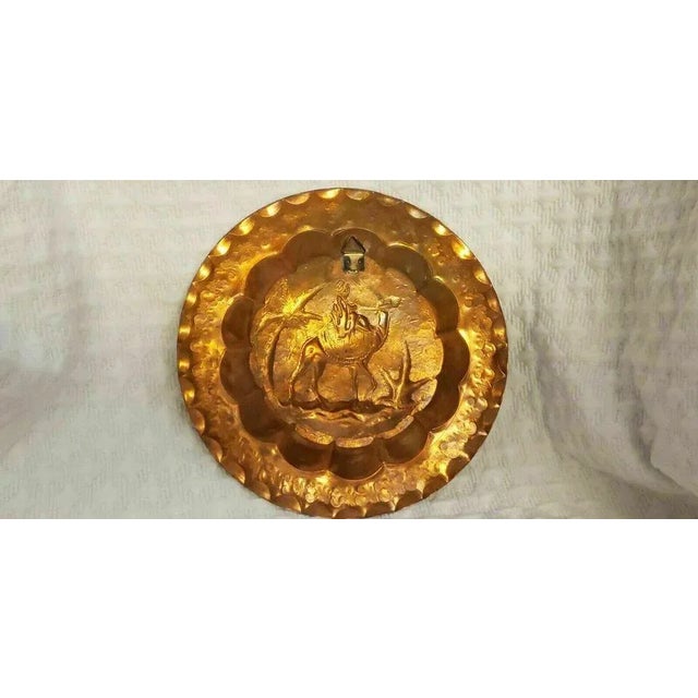 This exquisite antique plate is a true work of art. Handmade with intricate detailing, it features a stunning palm tree,...