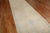 a 1920s turkish oushak runner with a soft creamy beige field, accents in sfot blue and green Measures: 3'8'' x 21'6''.