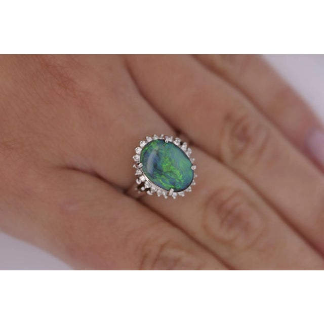 Metal 1990s 2.78 Carat Black Opal and Diamond Halo Platinum Filigree Ring Size 6 For Sale - Image 7 of 9