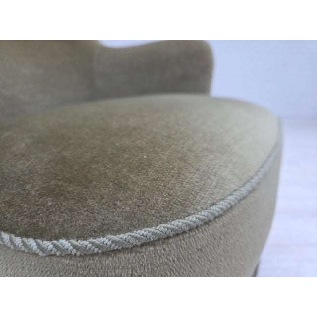 1970s, Danish highback armchair. Green furniture velour, springs in the seat, beech wood legs. Original very good...