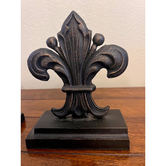 Beautiful pair of bookends. They were originally purchased in Napa, CA in 2004. The manufacturer is unknown.