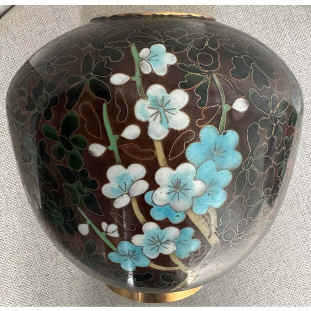 This is a very large ginger jar. It is a statement urn to display cutting flowers and other high end floral decors. The...