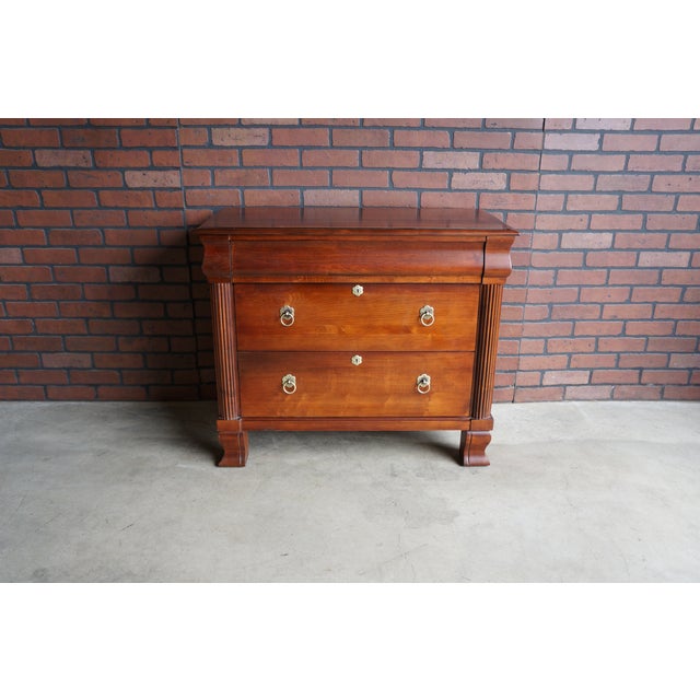 Ethan Allen bedside chests from the British Classics Collection. Featuring three drawers with ogee molding on the drawer...