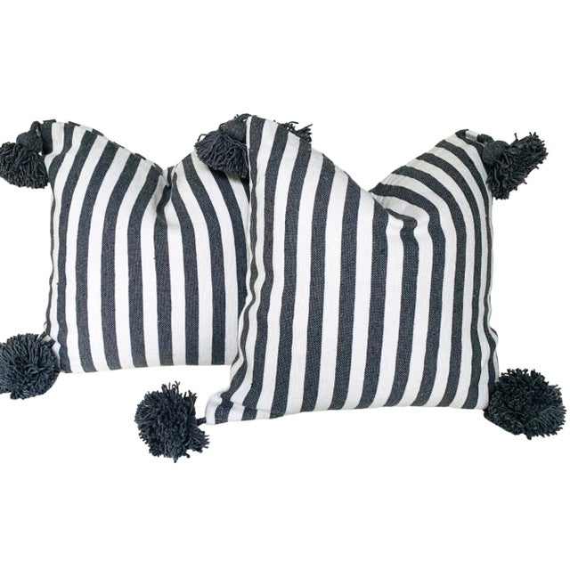 Pair of Moroccan handloomed cotton pom pom pillows with zipper closure New duck feather-and-down fill inserts. Pattern on...