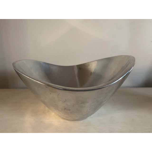 Vintage pair of Nambe bowls by Richard K Thomas. Bowls are two different sizes, smaller one is dated 1967 and the larger...