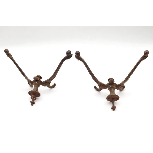 Victorian style hall tree hooks made of cast iron with a black finish. Good condition with rusted surface wear from prior...