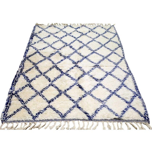 Moroccan Modern Hand-knotted with care using traditional rug-making techniques, this wool rug blends timeless...