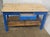 Made of blue-stained fir wood with a central drawer and fixed shelf. The lower space is 48 cm. The top has been replaced...