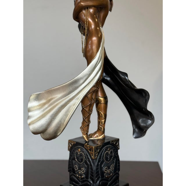 Design Plus Gallery presents a Bronze Sculpture of "Lovers and Idol", by Romain de Tirtoff of Erté. The art deco figural...