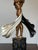 Design Plus Gallery presents a Bronze Sculpture of "Lovers and Idol", by Romain de Tirtoff of Erté. The art deco figural...