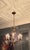 Beautiful Spanish Brass Chandelier with Eight Lights. Includes new insulators and covers. 21” wide x 24” High. Chain links...