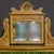 A very late Victorian marble topped washstand with an unusual tiled back depicting golden apples set of a dark green...