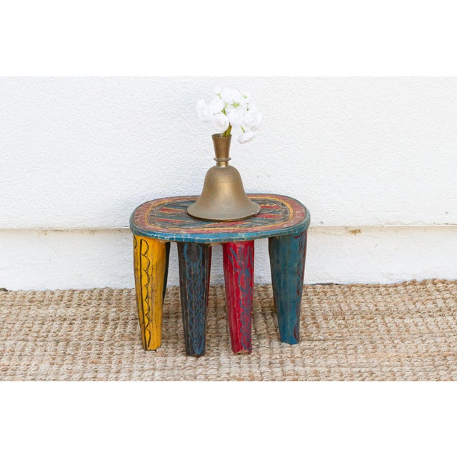 A unique piece of African art, this vintage Nupe table from Nigeria is a must-have for collectors and enthusiasts of Nupe...