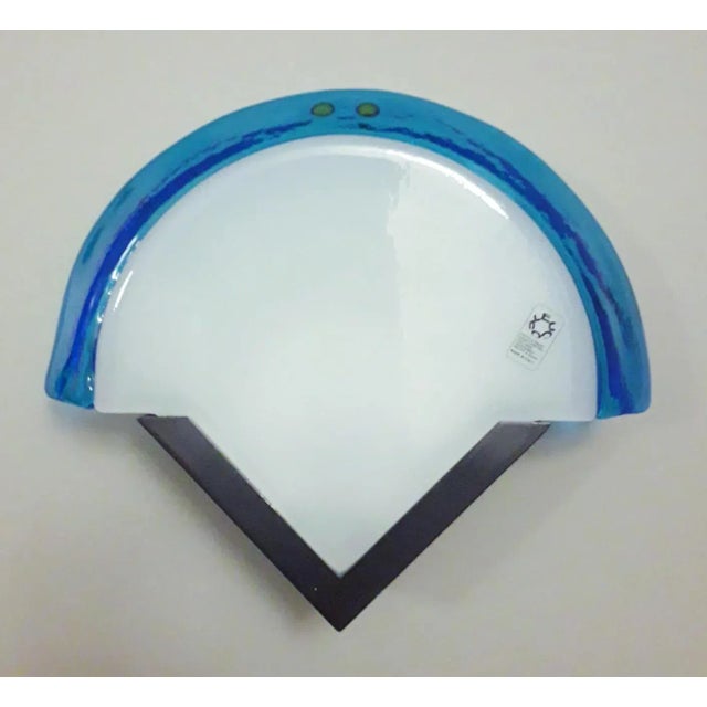 Vintage Italian wall lights with fan shaped blue and white Murano glass shades mounted on metal frames / made in Italy by...