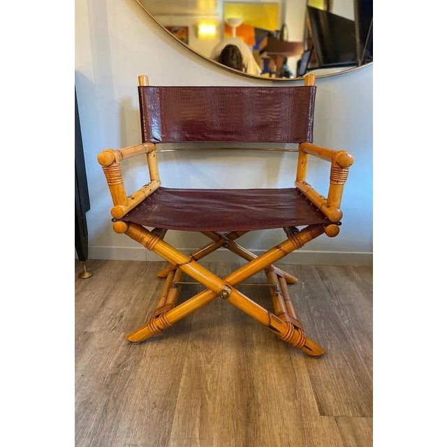 Director’s chair by Ryda Levi McGuire with a foldable frame in natural oak and bamboo. The seat and backrest are...