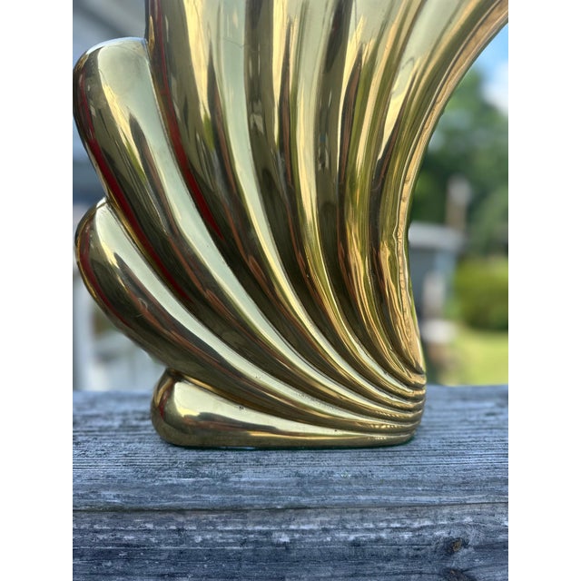 Beautiful pair of Dolbi Cashier sensually shaped cast pair of vases having an art deco vibe. Small is 12 w 12 h 2 d Large...