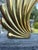 Beautiful pair of Dolbi Cashier sensually shaped cast pair of vases having an art deco vibe. Small is 12 w 12 h 2 d Large...