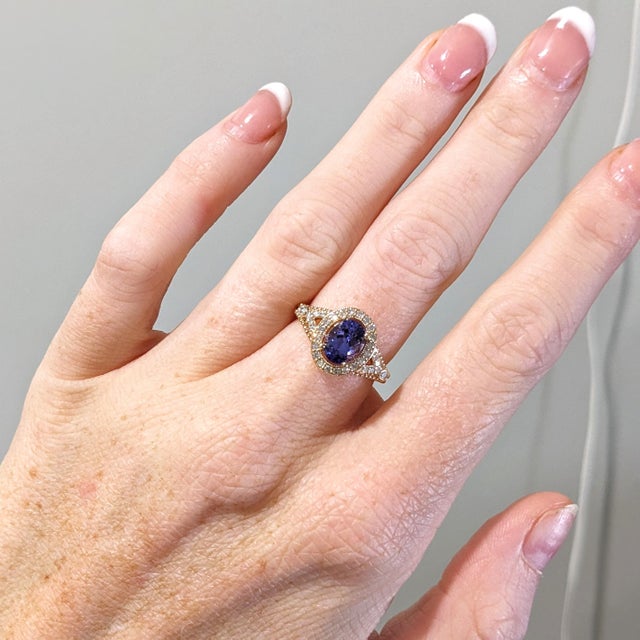 1.5ct oval tanzanite ring in solid 14k gold, showcasing an elegant 8×6 mm gemstone with rich violet-blue tones. Natural...