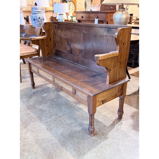 A charming vintage pine settle bench that blends practical storage with timeless country character. Crafted from solid...